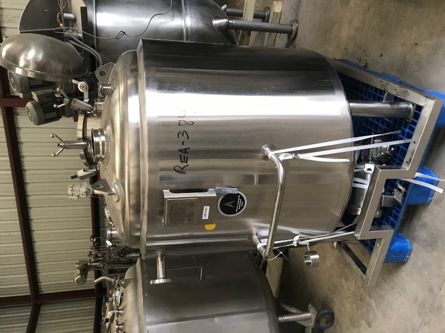 used 1000 Liter (264 Gal.) Stainless Steel Sanitary Pharmaceutical Grade Reactor. Jacketed Mixing Tank. Rated 40/Full Vacuum @ 300 Deg.F..  Jacket rated 100 PSI @ 300 Deg.F.. Bottom Discharge, Agitator  Lightnin SR5S50 Agitator with Stainless Steel 1/2 HP Motor 208-230/460V. Built by Apache Stainless Equipment.  Mounted on Stainless Steel Frame. No bottom valve. SN# S/N 10938-1-1.  Overall Dimensions: Approx. 80